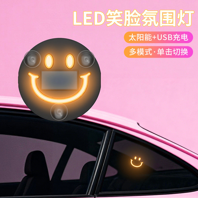 Car wireless solar-powered smiley face triangular window six-color neon interior ambient light LED car mount